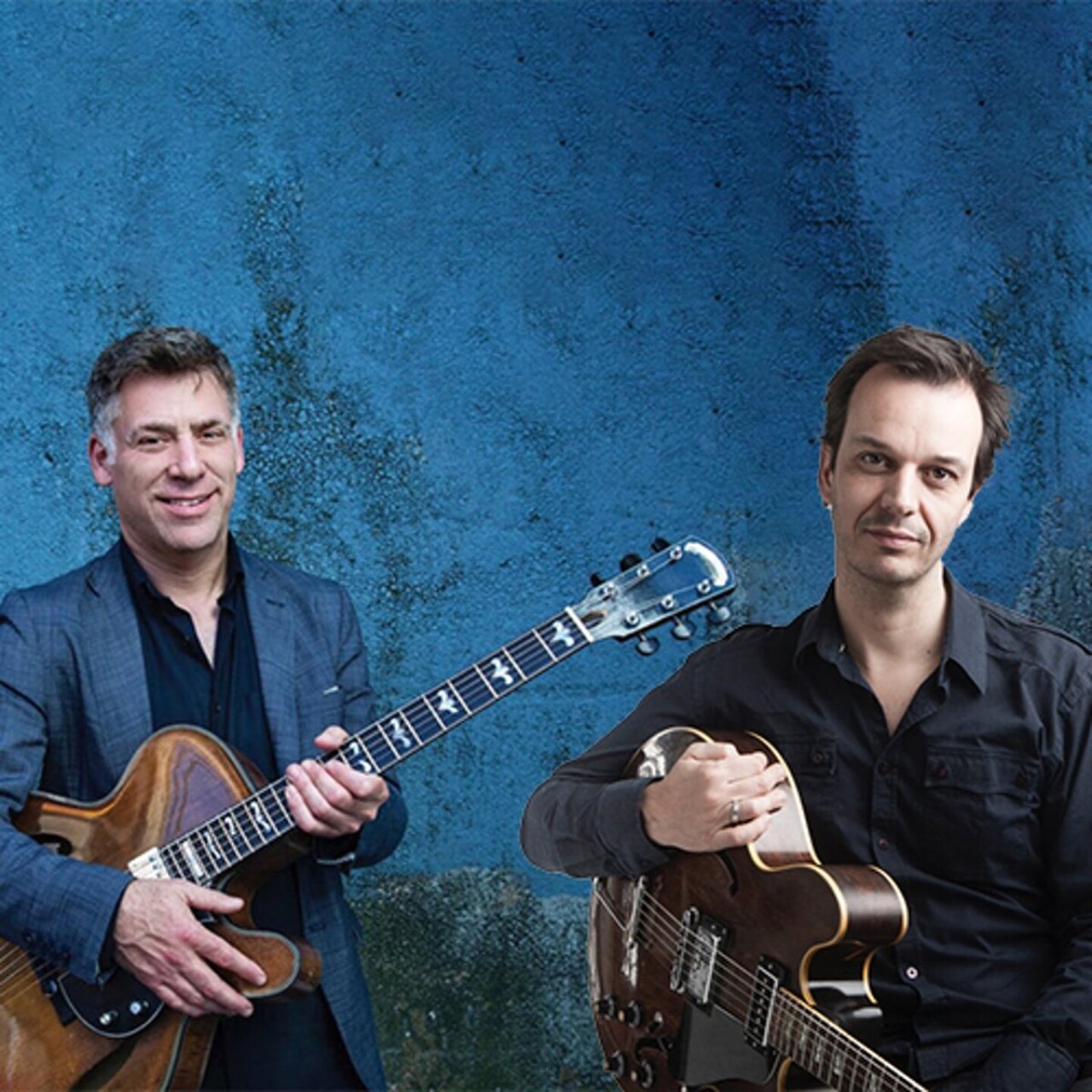 Foto 1 van 1, bijzondere ontmoeting van twee topgitaristen